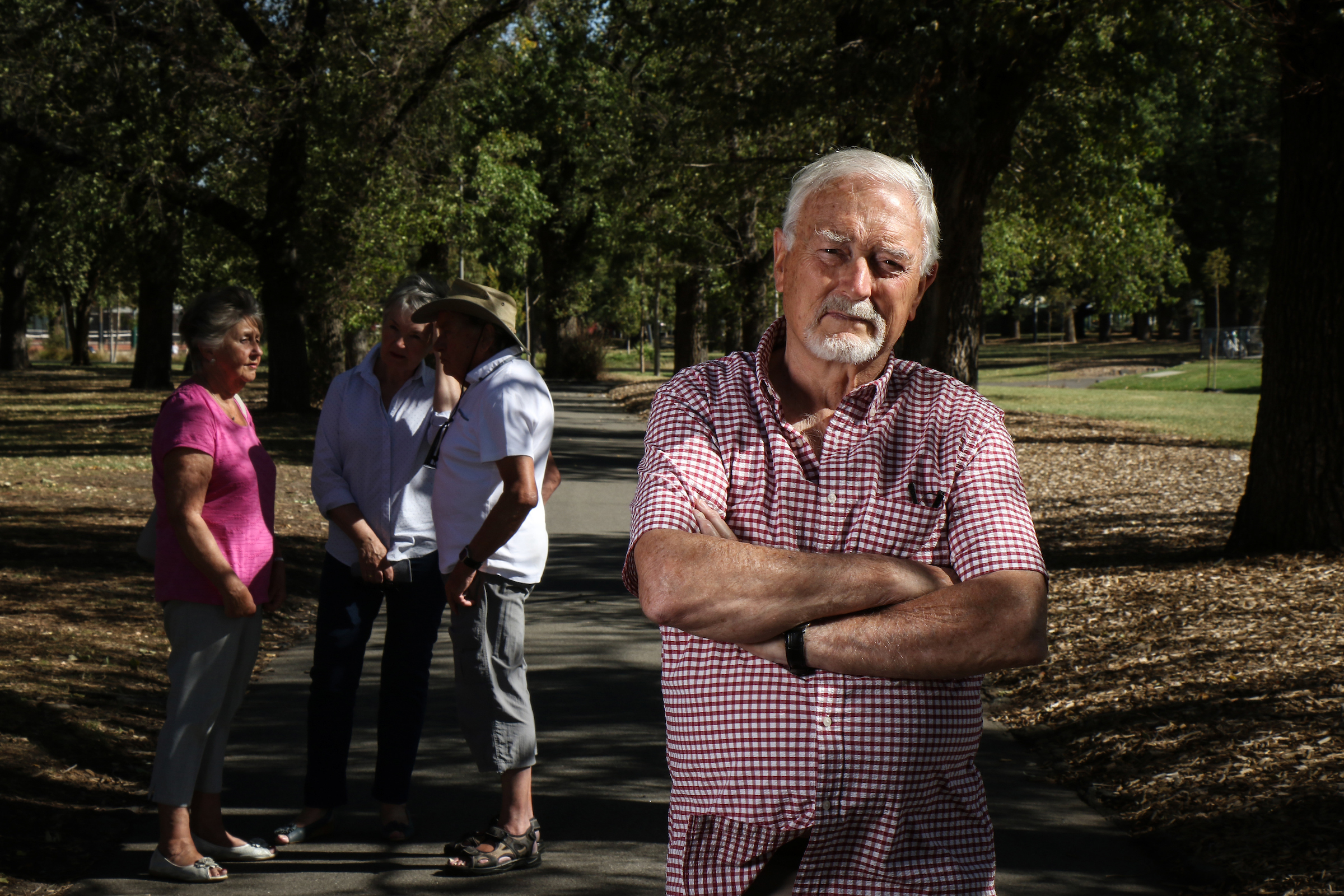 Older man facing camera