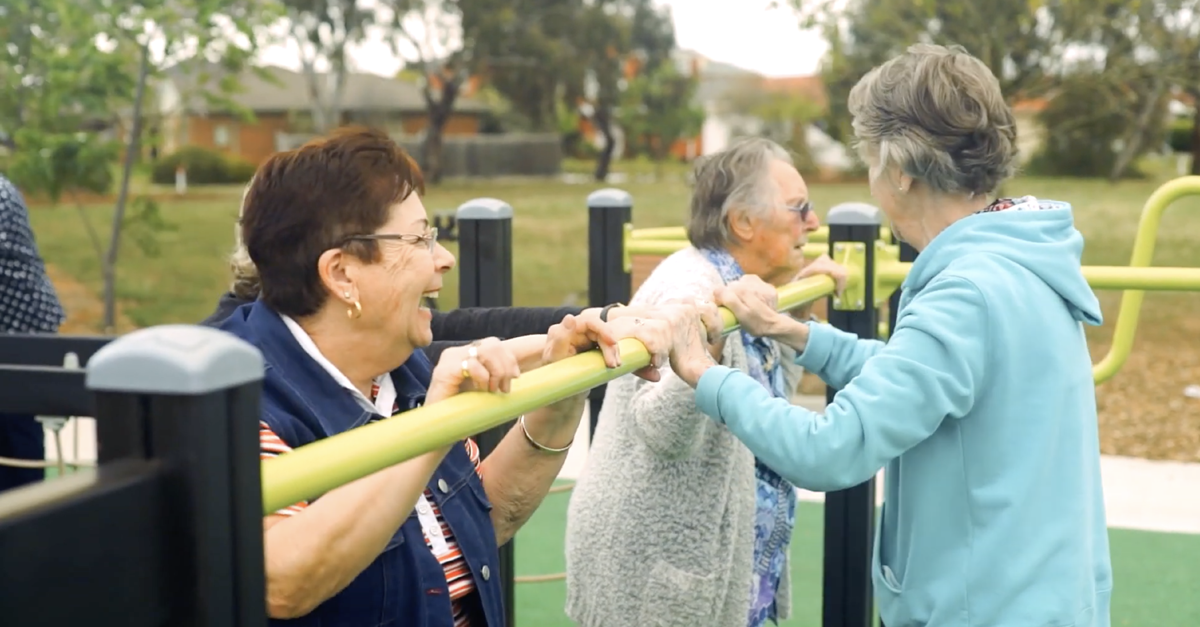 Seniors at an exercise park