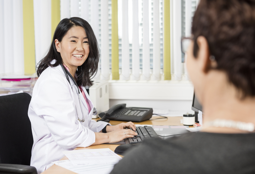 Smiling Doctor with patient