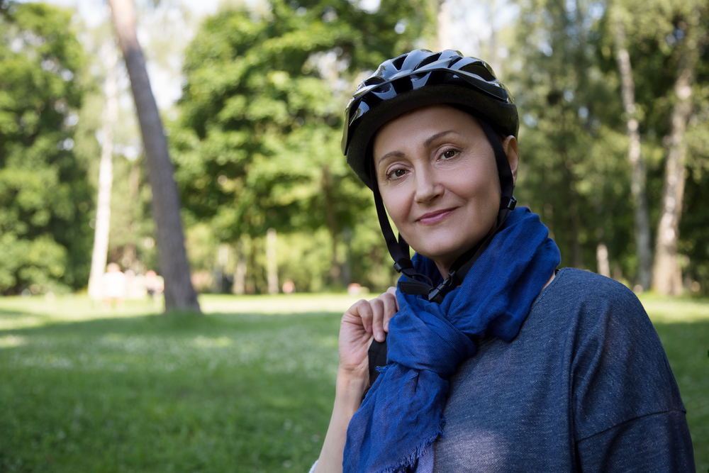 Woman with bicycle helmet