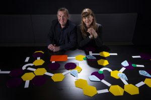 Dr Marius Foley and Dr Leah Heiss sitting at a table.