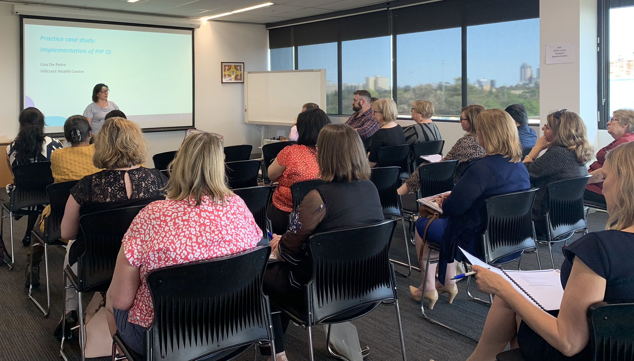 Practice managers sitting in a room at their network meeting held in Parkville in November.