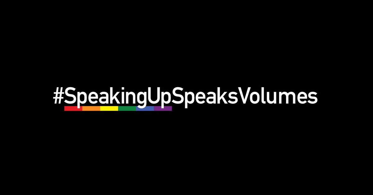 White text on black background with rainbow motif that reads "#SpeakingUpSpeaksVolumes"