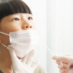 A young boy being tested for respiratory illness at a General Practice Respiratory Clinic.