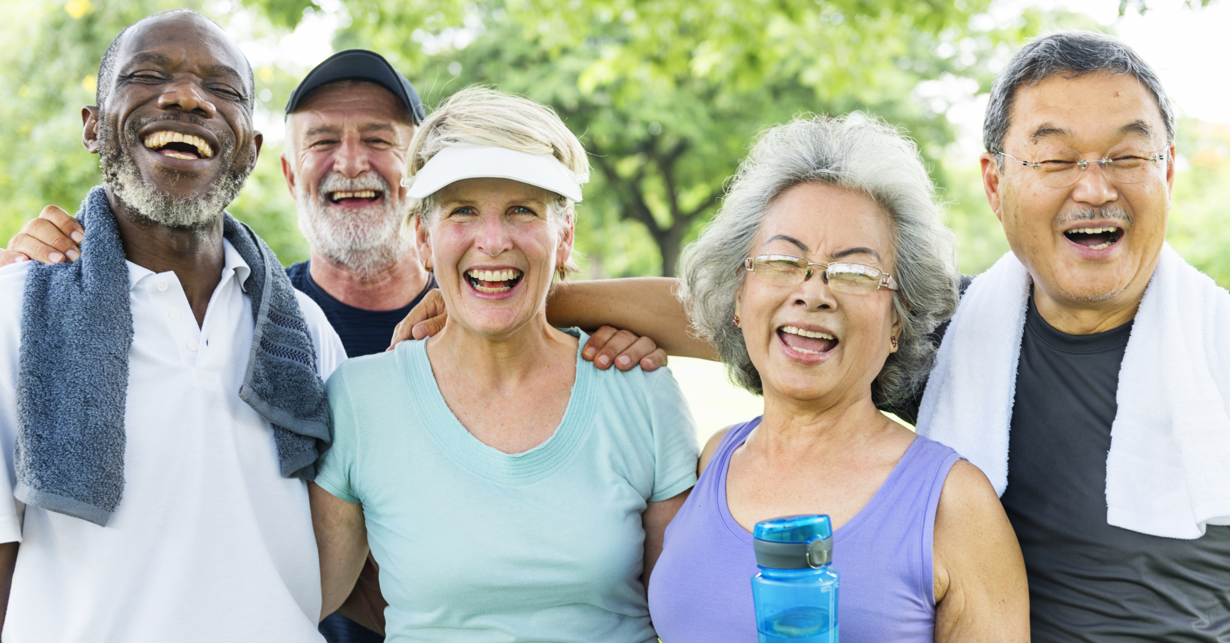 A group of 5 older people smiling. Cover image for Early interventions healthy ageing project tender.