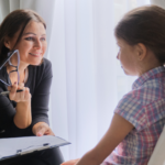 paediatric psychiatrist with child