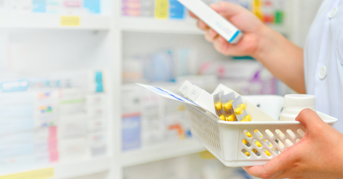 Pharmacist holding medication