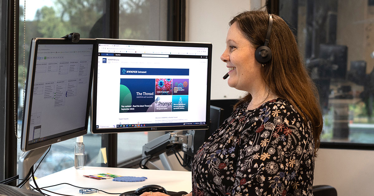 NWMPHN staff member Paulette Belcastro working on the computer