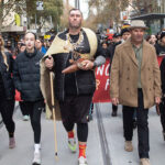 Kerrupmara Gunditjmara man Travis Lovett completes the final steps of the Walk for Truth, through Melbourne CBD