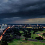 An image showing dark clouds emerging over inner Melbourne