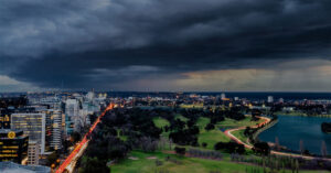 An image showing dark clouds emerging over inner Melbourne